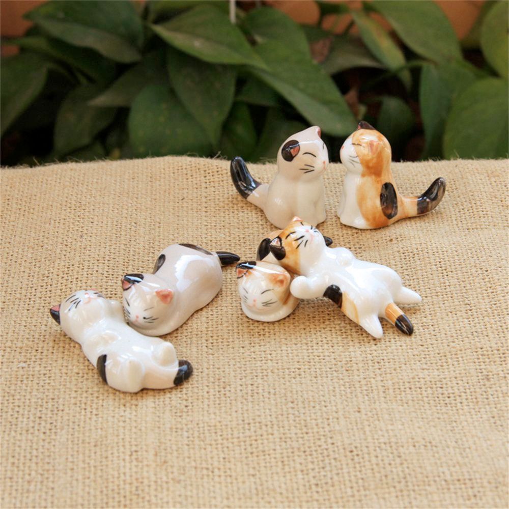 
                  
                    Porcelain Cat Chopstick Holders Set of Six - Yoru Says
                  
                